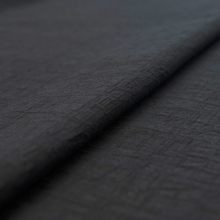 Japanese Cotton Wrinkled Dobby in Black fabric with textured crumpled weave