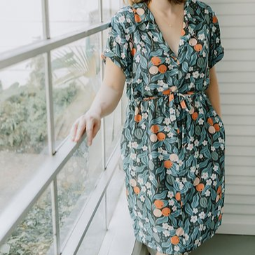 Sew to Grow Sydni Shirt-Dress pattern showing optional collar, front pleated pockets, and tie belt.