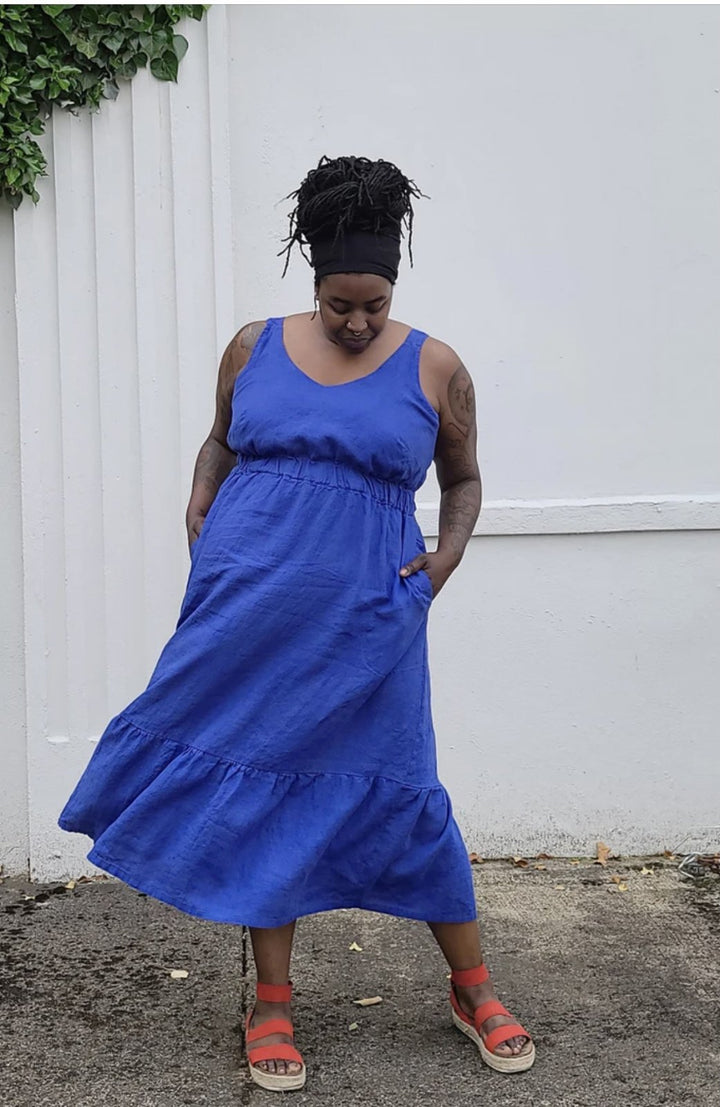 Sew House Seven Sauvie Sundress sewing pattern for standard sizes 00–20 with strappy V-neck design, pocket variations, and customizable lengths.