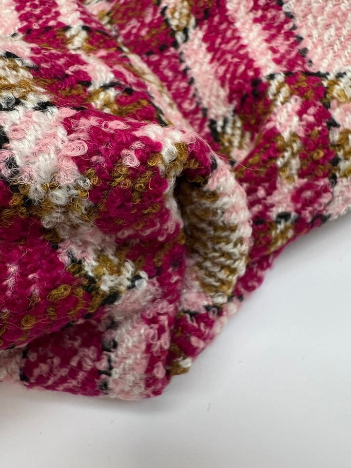Italian bouclé suiting fabric in beige and pink plaid, medium-heavy acrylic polyamide blend, ideal for structured coats, skirts, and tailored suits.