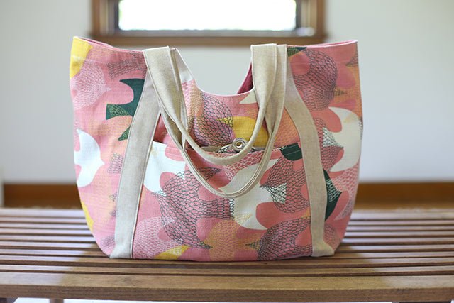 Noodlehead Poolside Tote sewing pattern for DIY beach bag with pockets and room for towels