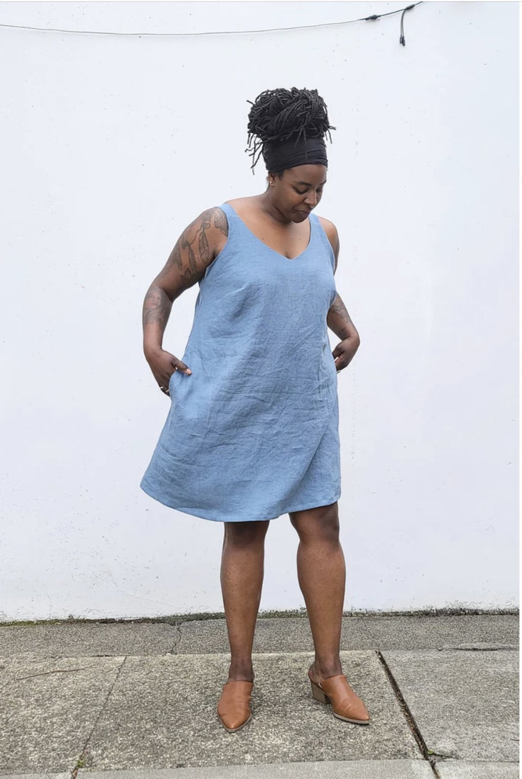 Sew House Seven Sauvie Sundress sewing pattern for standard sizes 00–20 with strappy V-neck design, pocket variations, and customizable lengths.