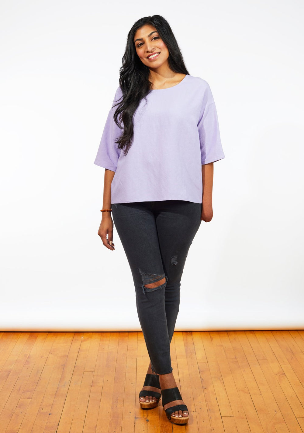Grainline Studio Corbin Top sewing pattern for sizes 0–18, featuring ruffled cap and 3/4-length sleeve options.