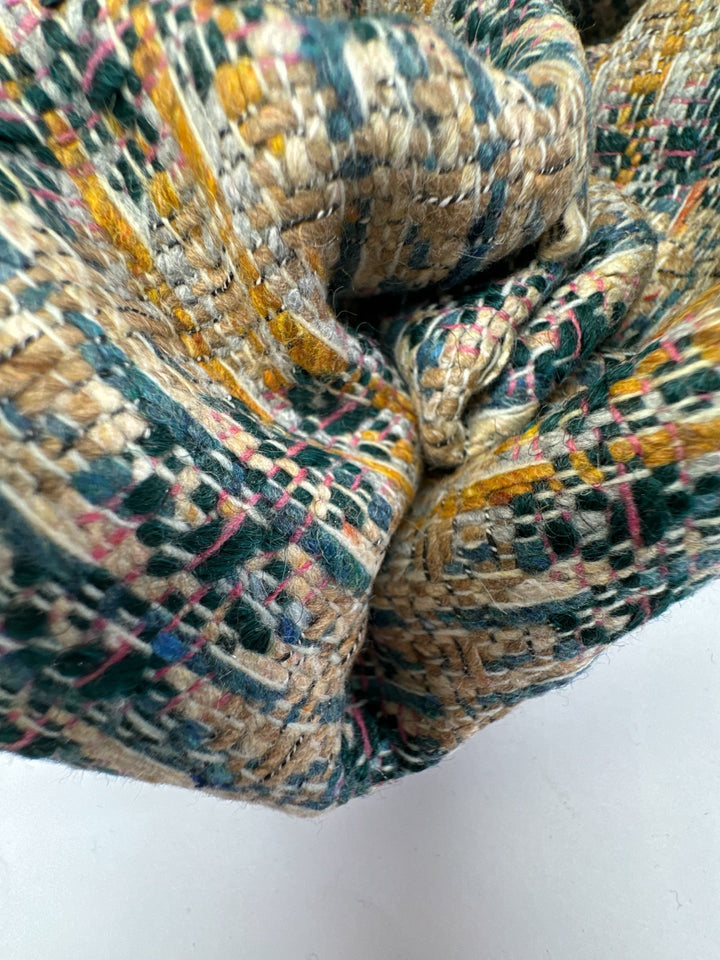 Italian tweed fabric with abstract plaid in beige, blue, and yellow tones, cotton wool blend, perfect for structured coats, suiting, and dresses.