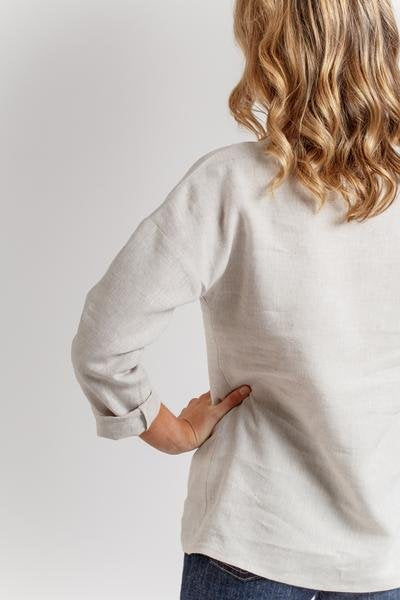 Megan Nielsen Olive sewing pattern for relaxed-fit blouse and dress with V-neck insert, optional patch pocket, and gathered skirt
