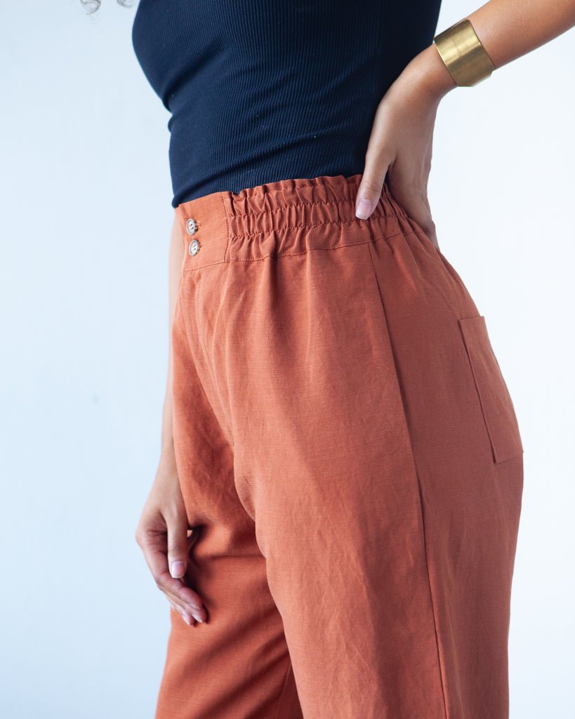 True Bias Dani Short & Pant sewing pattern with shorts and ankle-length pant variations, paperbag waist, pockets, and cuffed hem in sizes 0–18.