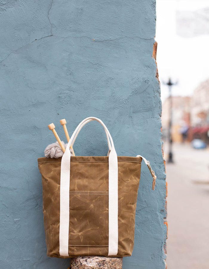 Noodlehead Buckthorn Backpack and Tote sewing pattern for DIY zip-top organizer bag with pockets