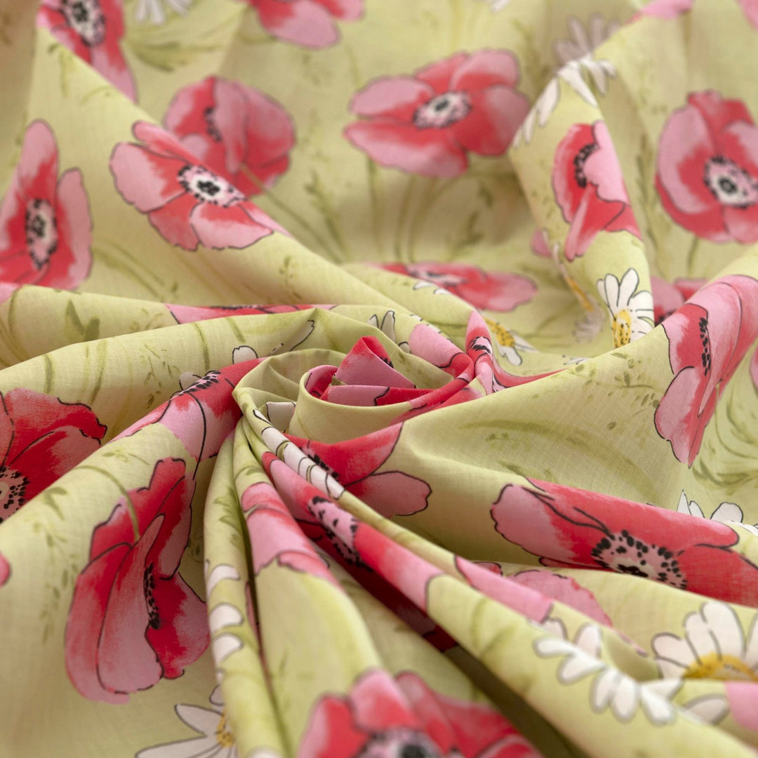 Cotton Lawn Spring Blossom – 100% cotton, 56 inches wide, lightweight breathable fabric with pink and red floral prints for blouses, dresses, and skirts
