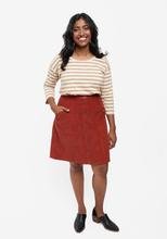 Grainline Studio Reed Skirt sewing pattern sizes 14–30 with inset and patch pockets, button front or invisible zipper closure, medium-weight fabrics