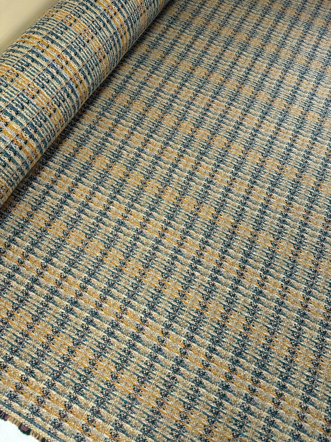 Italian tweed fabric with abstract plaid in beige, blue, and yellow tones, cotton wool blend, perfect for structured coats, suiting, and dresses.