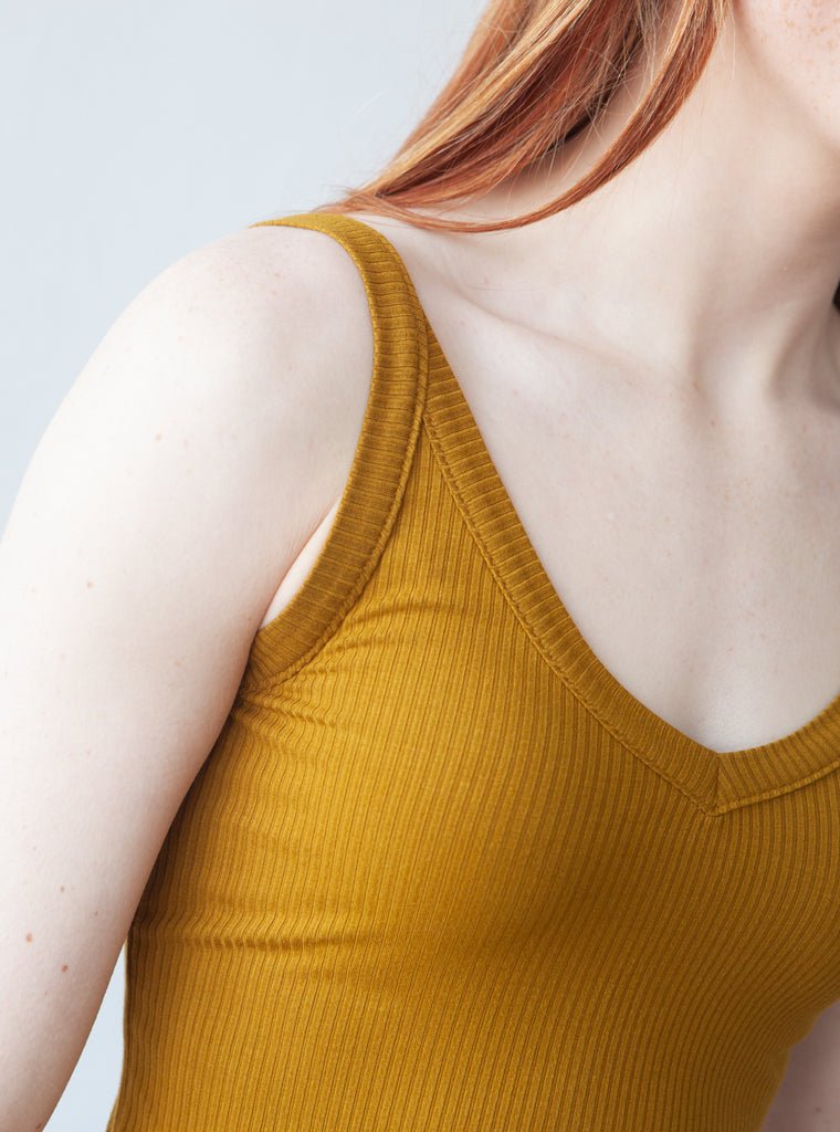 True Bias Zoey Tank & Dress sewing pattern with cropped tank, hip-length tank, and fit-and-flare dress variations in sizes 0–32.