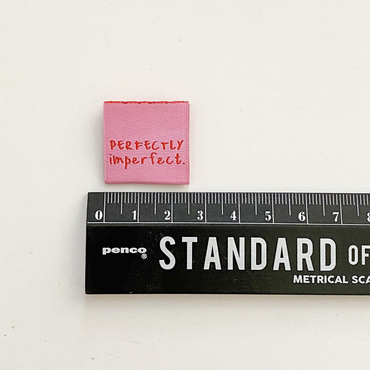 Kylie and the Machine Perfectly Imperfect woven labels - pink and red HD Oeko-Tex certified sewing tags for clothing branding