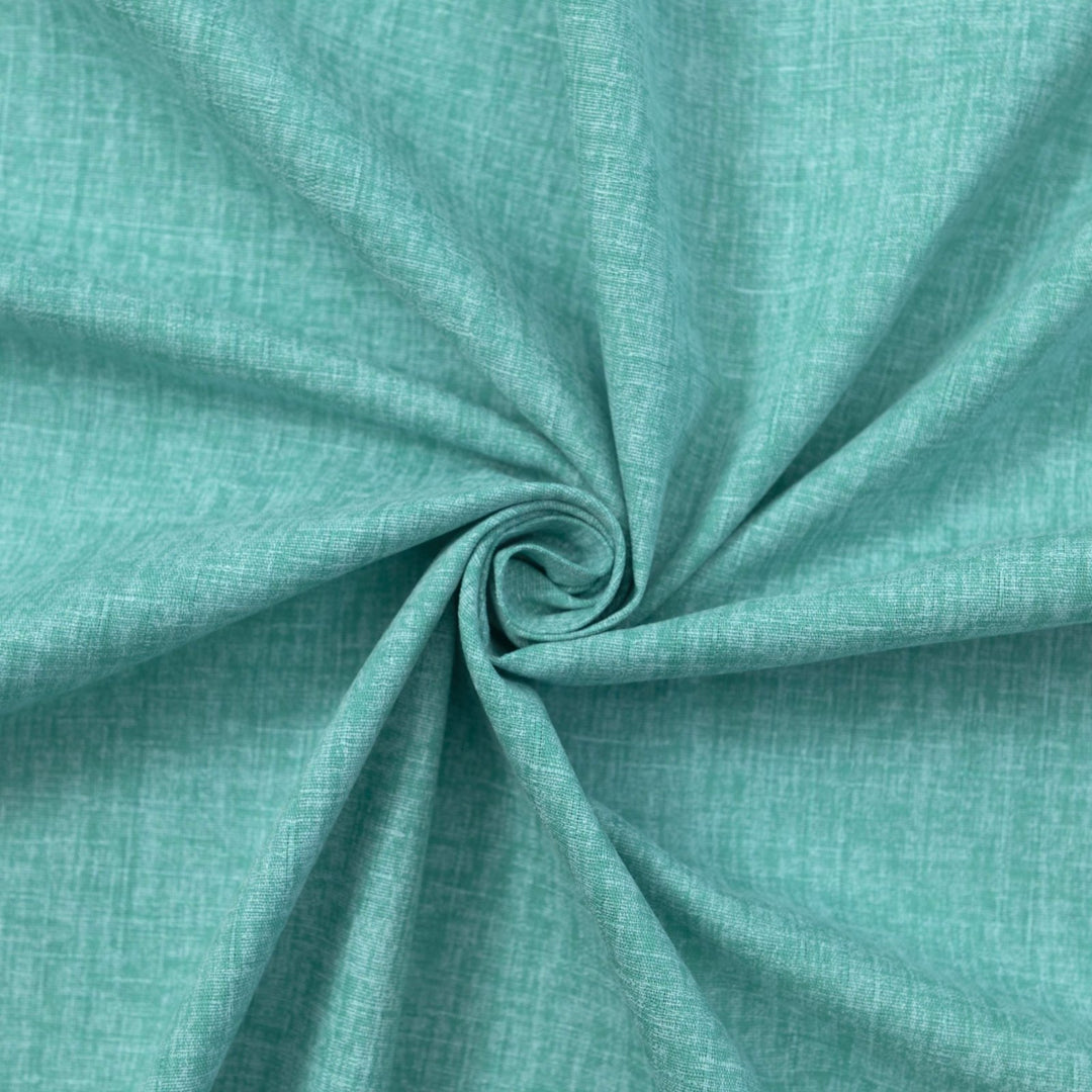 Japanese Dobby Heathered in Teal cotton fabric with textured weave