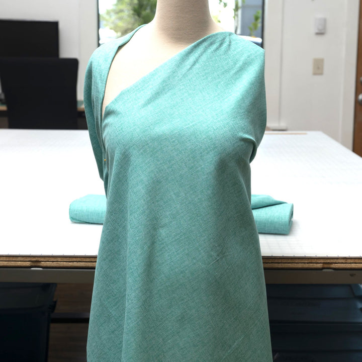 Japanese Dobby Heathered in Teal cotton fabric with textured weave