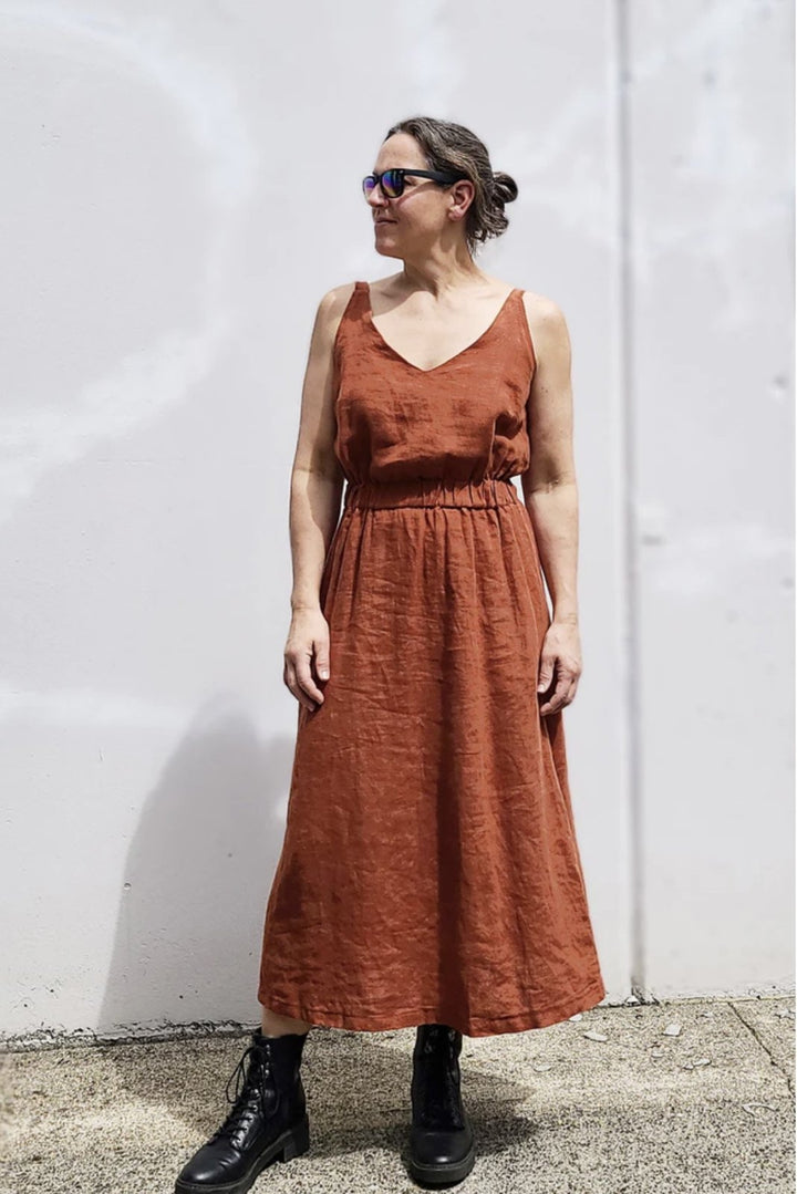 Sew House Seven Sauvie Sundress sewing pattern for standard sizes 00–20 with strappy V-neck design, pocket variations, and customizable lengths.