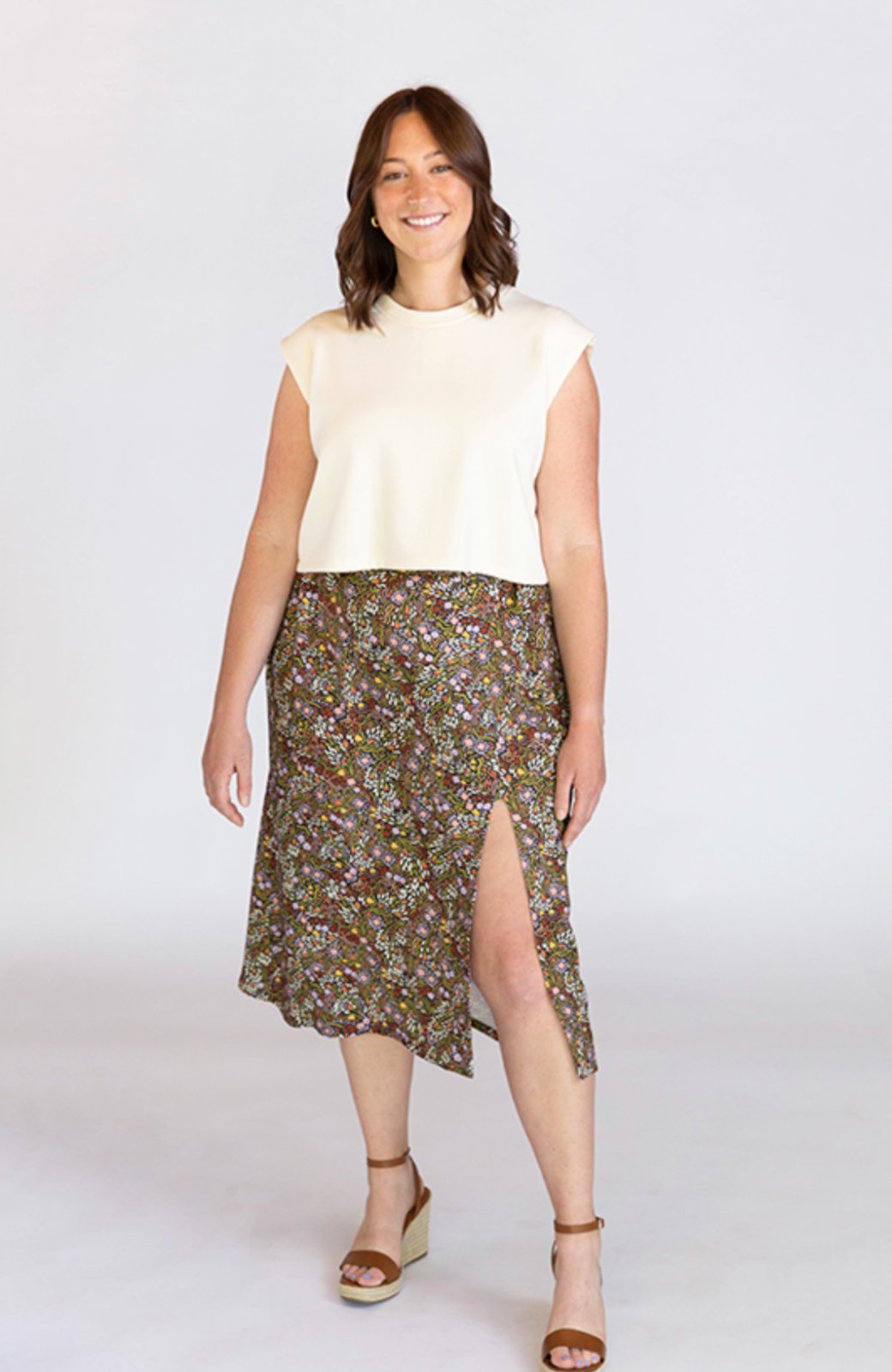 Chalk & Notch Evelyn Skirt sewing pattern with button-front and elastic waist variations in midi and mini lengths, sizes 0–30.