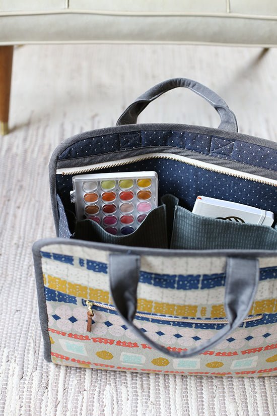 Noodlehead Maker’s Tote sewing pattern for DIY craft organizer bag with zippered pockets and two sizes