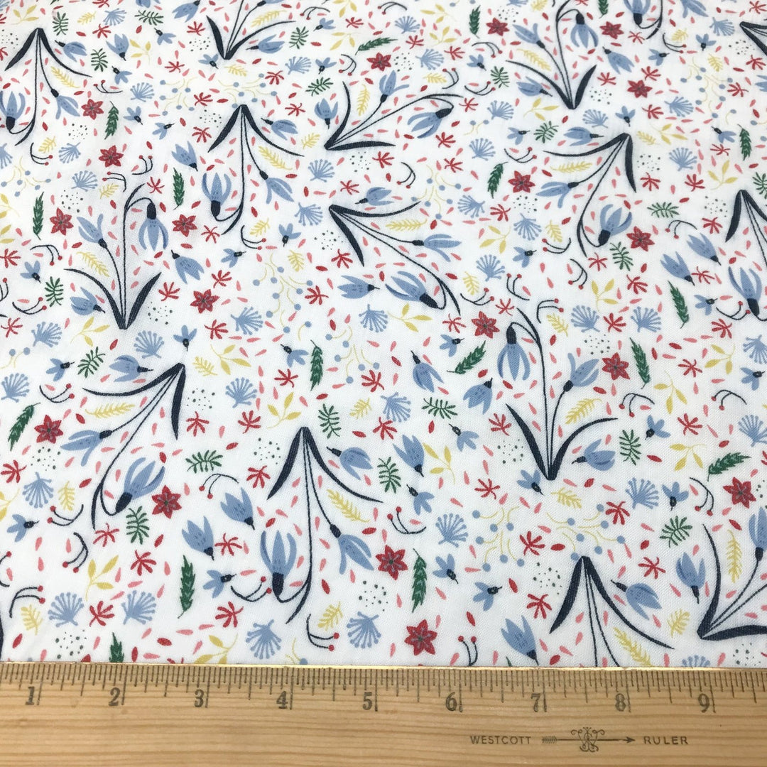 Cotton Viscose Voile Floral Party White fabric showing sky blue, coral, pink, green, and wheat floral pattern