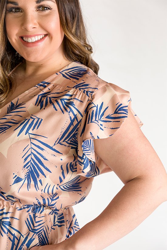 Chalk & Notch Orchid Midi Dress sewing pattern featuring wrap bodice, flowing midi skirt, and sleeve options with ruffle or long gathered sleeves.
