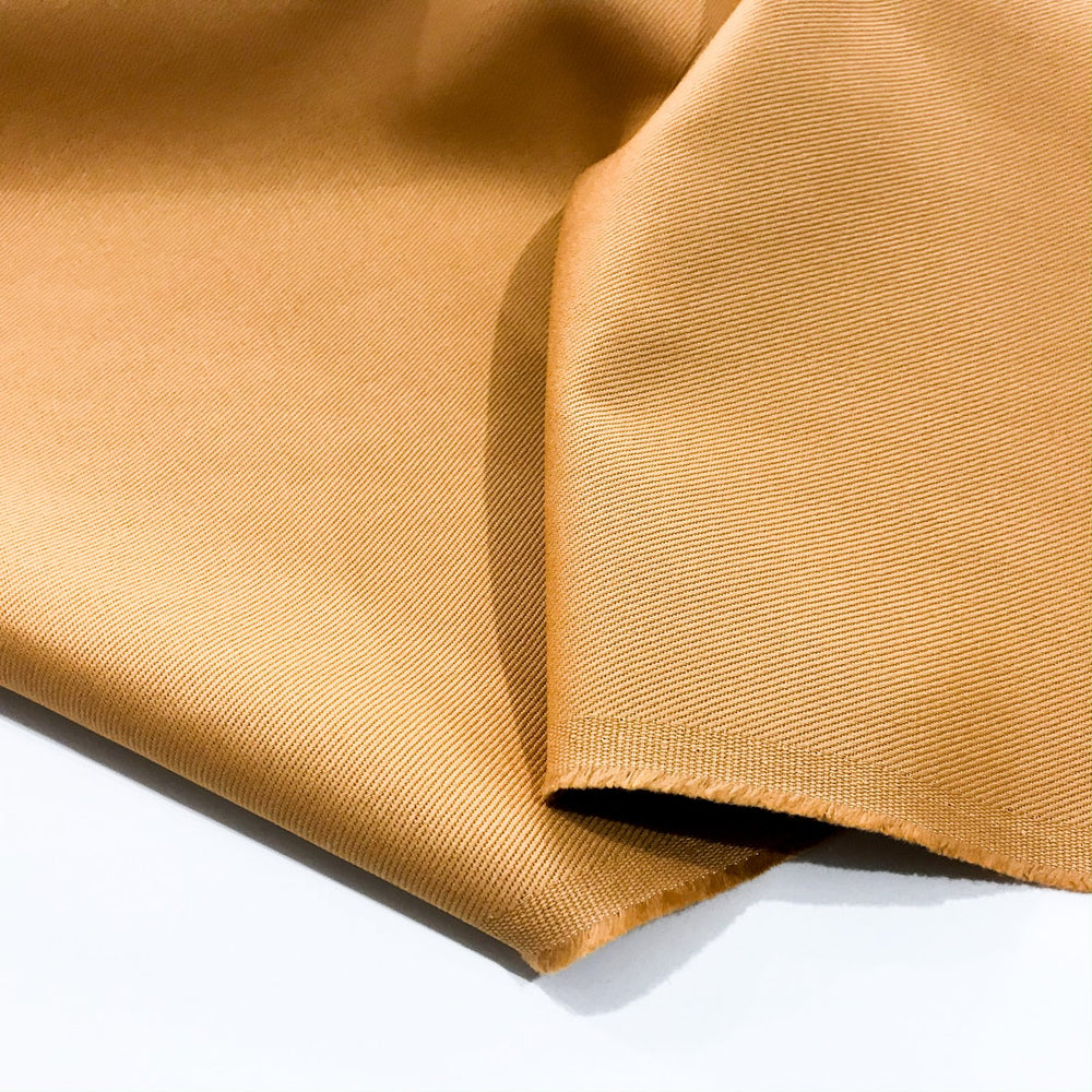 Ventana Twill Soft Mustard 100% cotton fabric, mid-weight 7.9 oz/yard, perfect for pants, jackets, and tailored sewing projects