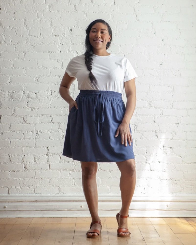 True Bias Mave Skirt sewing pattern in drapey fabric, featuring elastic waistband, inseam pockets, and optional ruffle hem in multiple lengths.