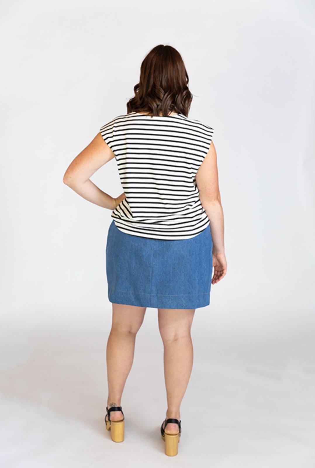 Chalk & Notch Evelyn Skirt sewing pattern with button-front and elastic waist variations in midi and mini lengths, sizes 0–30.