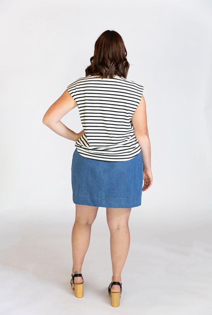 Chalk & Notch Evelyn Skirt sewing pattern with button-front and elastic waist variations in midi and mini lengths, sizes 0–30.