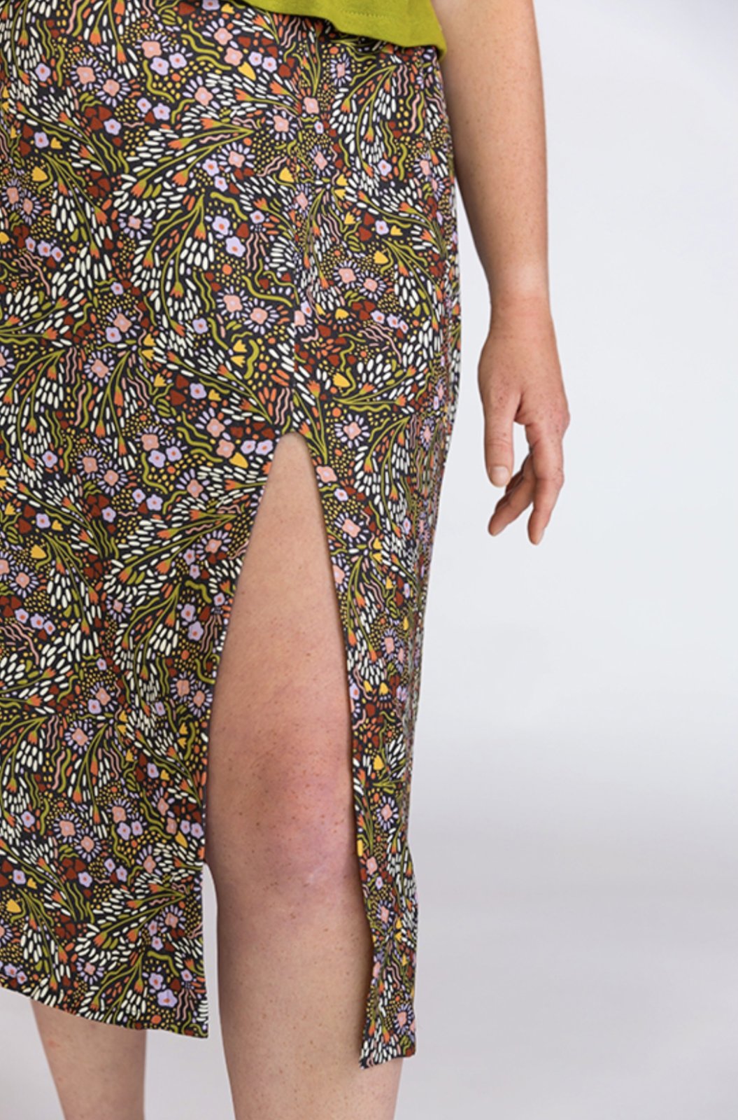 Chalk & Notch Evelyn Skirt sewing pattern with button-front and elastic waist variations in midi and mini lengths, sizes 0–30.