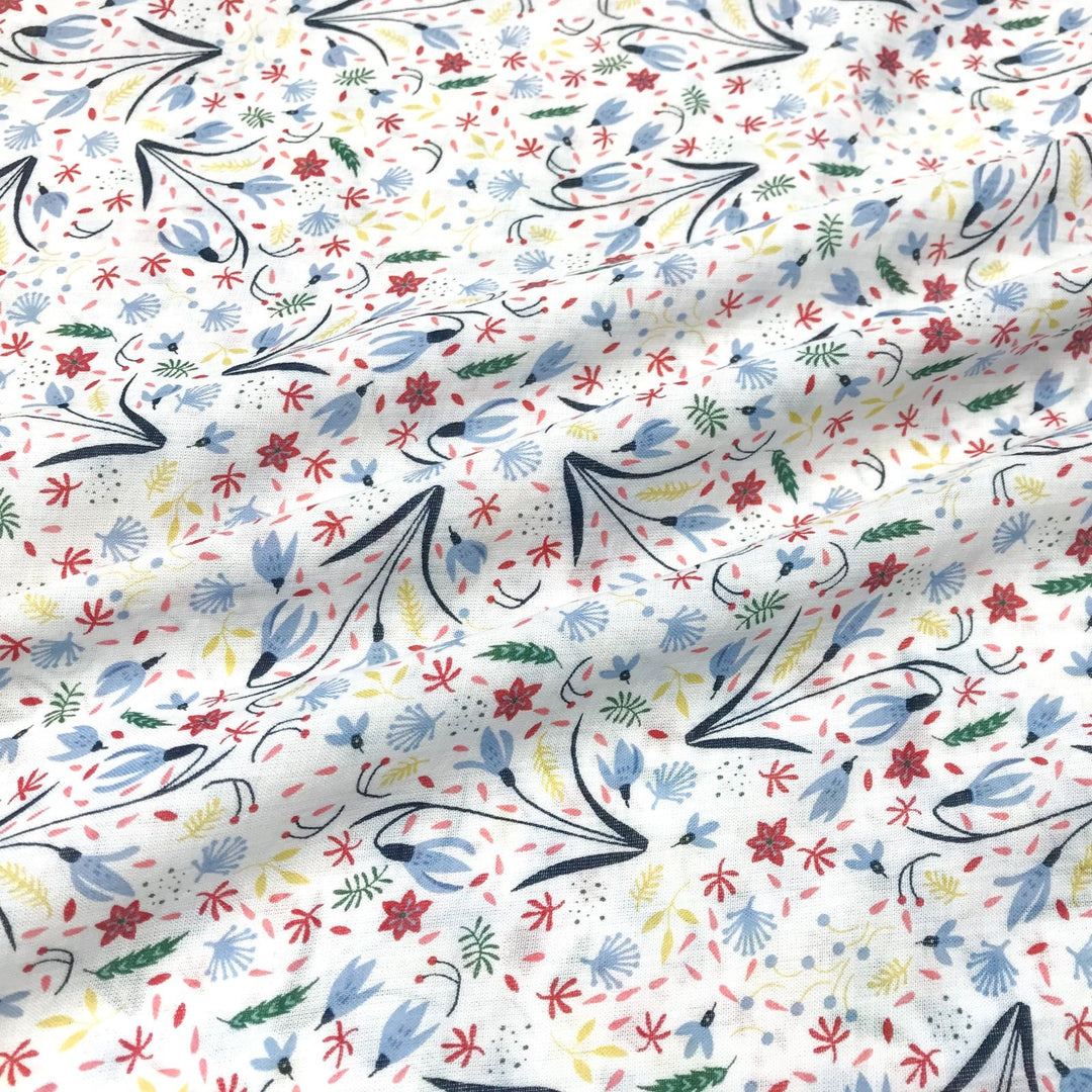 Cotton Viscose Voile Floral Party White fabric showing sky blue, coral, pink, green, and wheat floral pattern