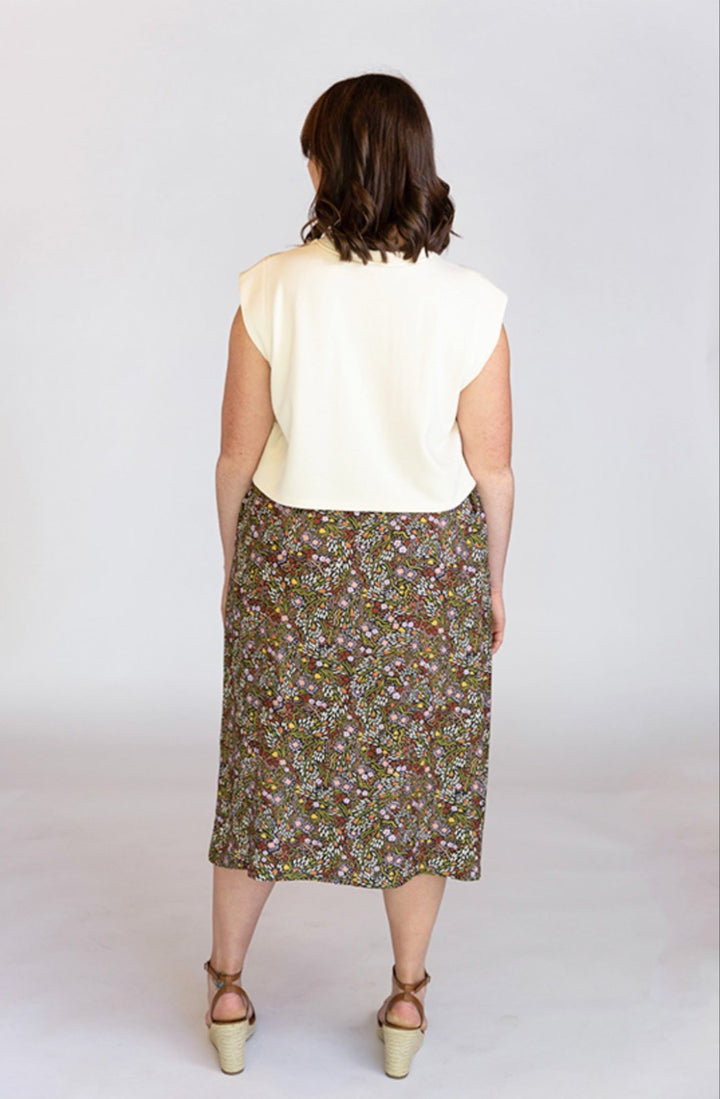 Chalk & Notch Evelyn Skirt sewing pattern with button-front and elastic waist variations in midi and mini lengths, sizes 0–30.