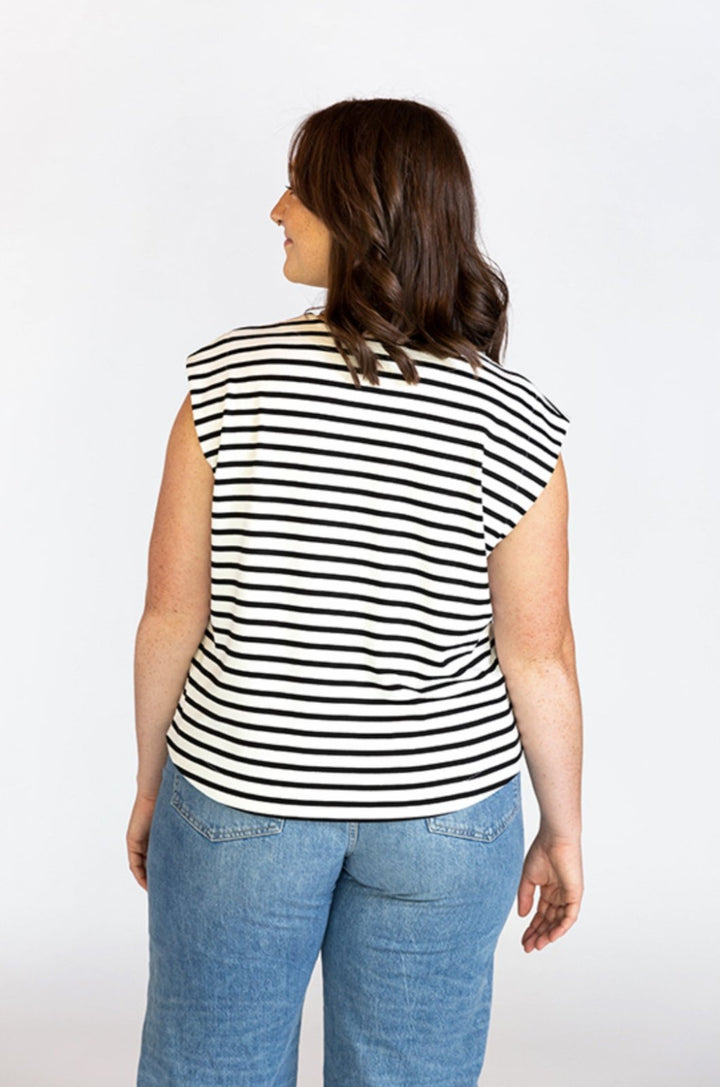 Chalk & Notch Max Tee sewing pattern with cropped and hip-length options, muscle tee shoulders, and three neckline finishes in sizes 0–30.