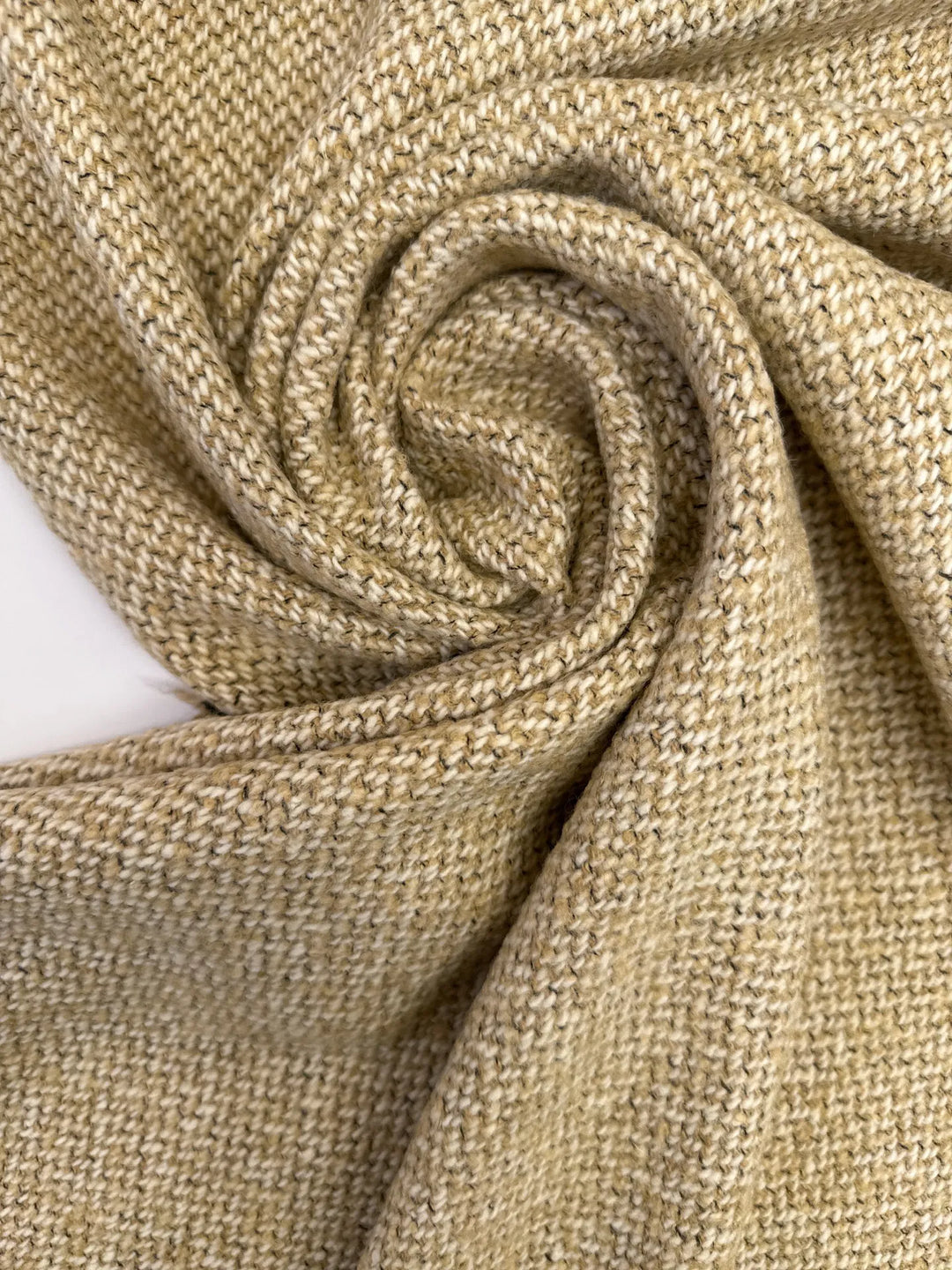 Elegant Italian cream and beige Tweed Twill Weave, a wool-silk blend ideal for suiting, coats, skirts, and dresses with timeless durability.