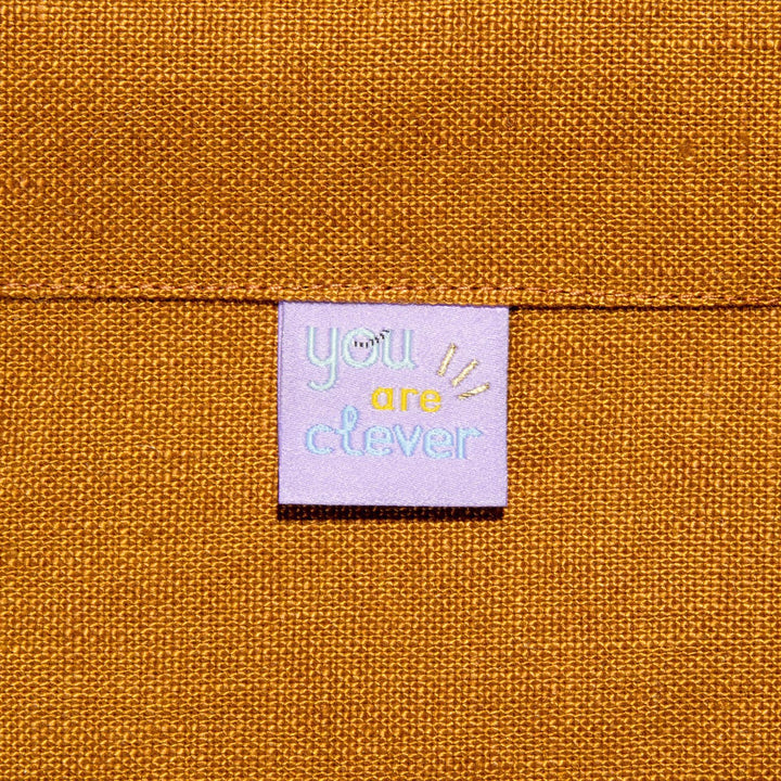 Kylie and the Machine Going Places kids’ labels by Brook Gossen – colorful woven tags and stickers with positive affirmations