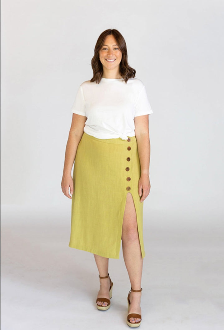 Chalk & Notch Evelyn Skirt sewing pattern with button-front and elastic waist variations in midi and mini lengths, sizes 0–30.