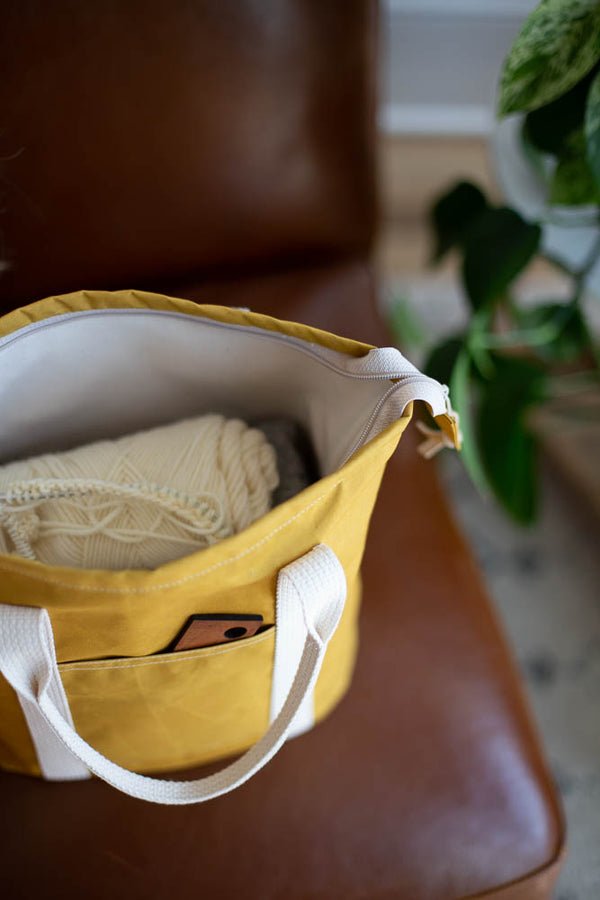 Noodlehead Buckthorn Backpack and Tote sewing pattern for DIY zip-top organizer bag with pockets