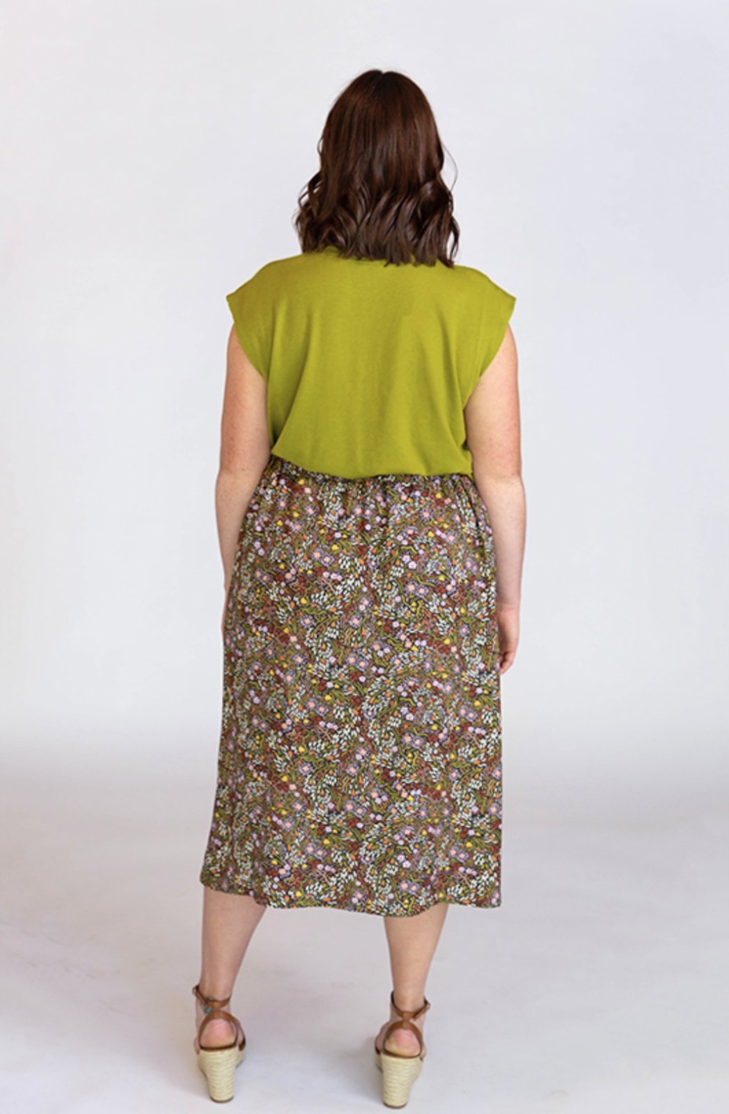 Chalk & Notch Evelyn Skirt sewing pattern with button-front and elastic waist variations in midi and mini lengths, sizes 0–30.