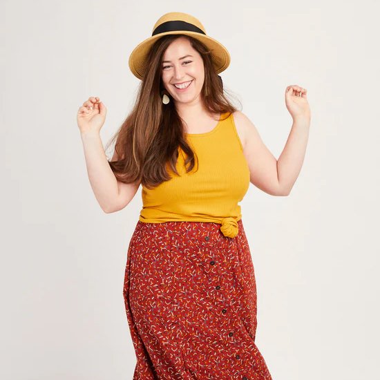 Cashmerette Saybrook Tank sewing pattern with scoop neckline and knot front hem in stretch knit fabric