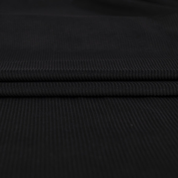 Black 8 wale cotton corduroy fabric - Italian deadstock textile for sewing jackets, pants, and skirts