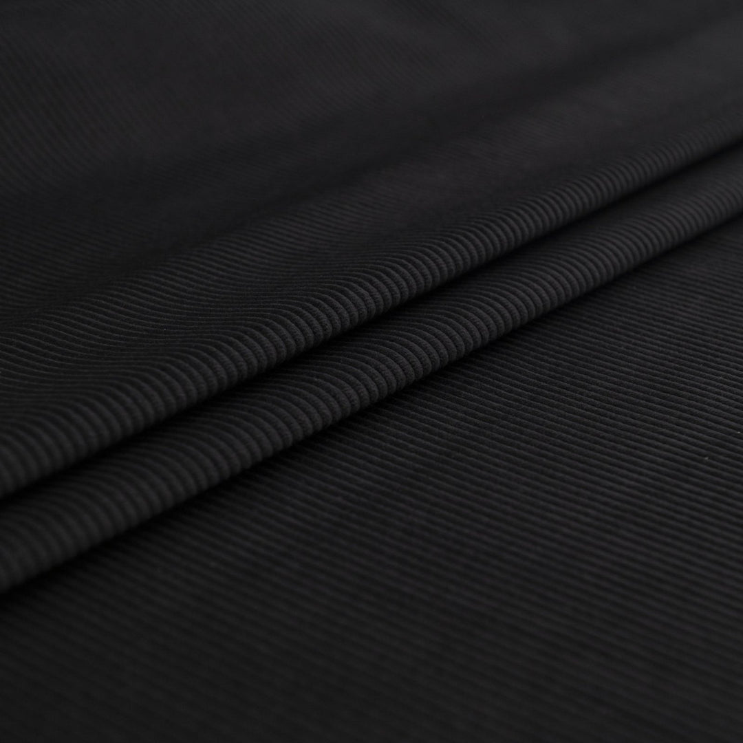 Black 8 wale cotton corduroy fabric - Italian deadstock textile for sewing jackets, pants, and skirts