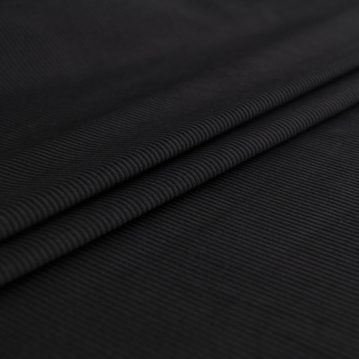 Black 8 wale cotton corduroy fabric - Italian deadstock textile for sewing jackets, pants, and skirts
