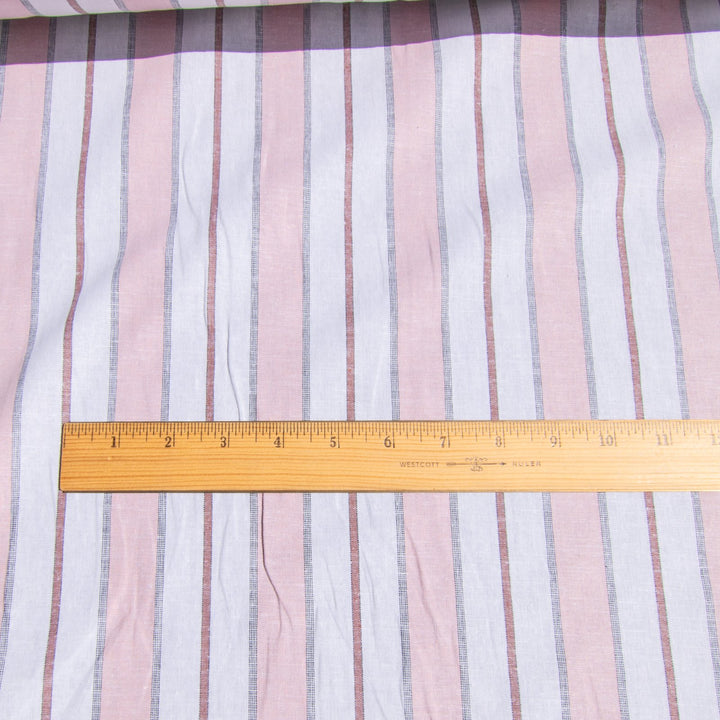 Pink and white yarn-dyed cotton chambray poplin fabric close-up texture