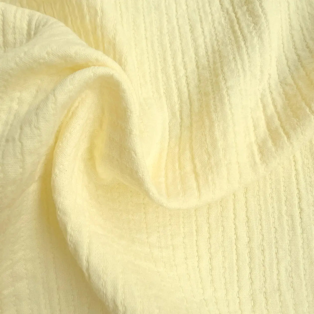 Cotton Double Layered Woven Stripes fabric in vibrant lemon yellow, perfect for shirts and loungewear.