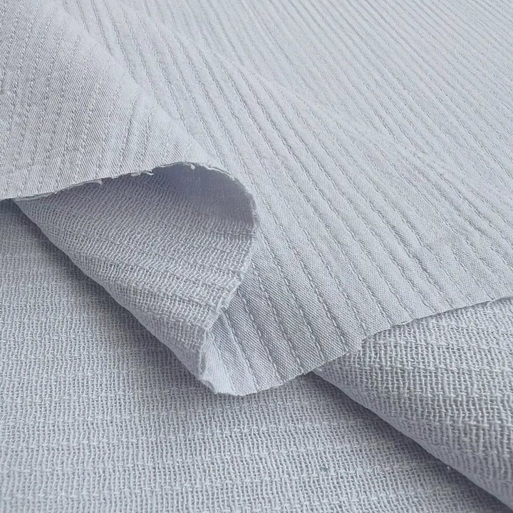 Cotton Double Layered Woven Stripes - Sky fabric, 53-inch width, 100% cotton textile from Spain in blue stripes for shirts, blouses, and loungewear