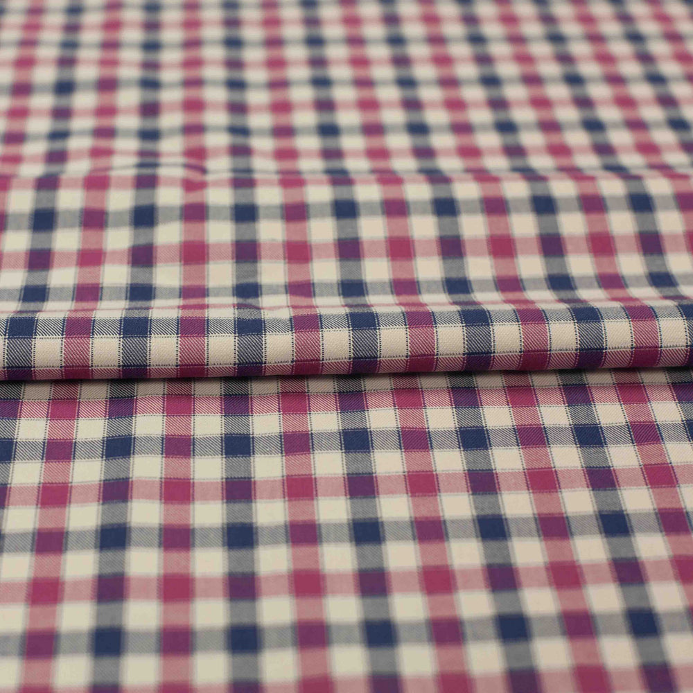 Lightweight Tattersall check cotton twill fabric in blue, pink, and cream