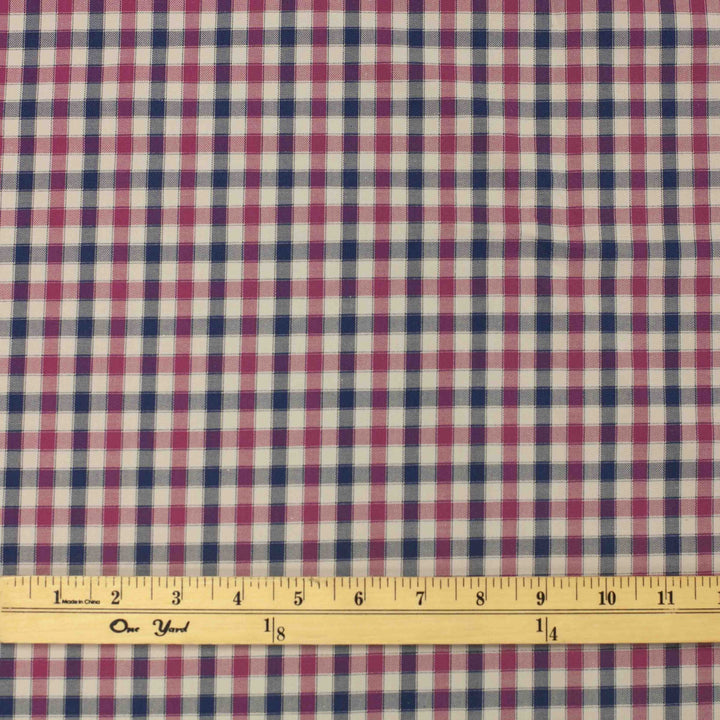 Lightweight Tattersall check cotton twill fabric in blue, pink, and cream