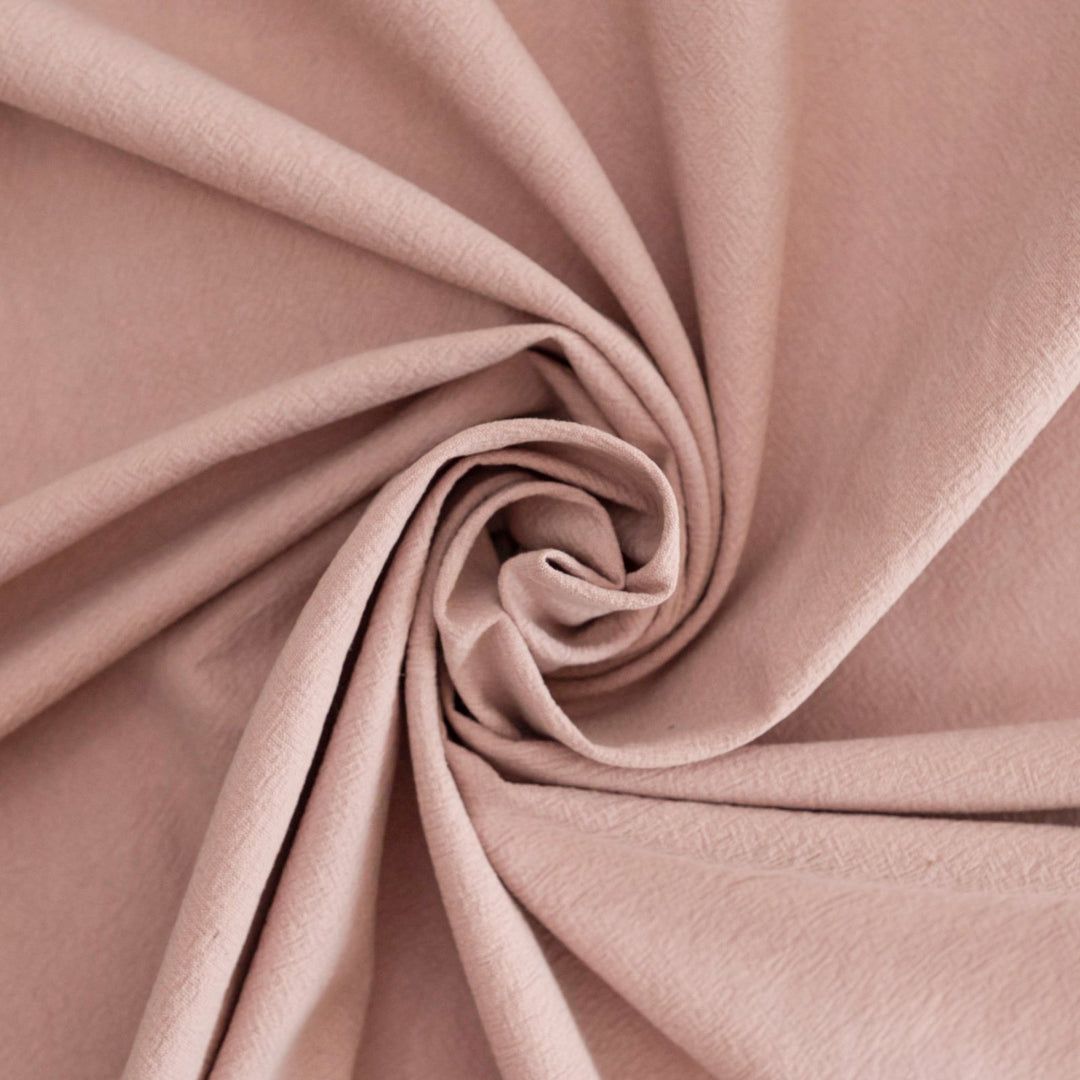 Crinkle Cotton Vintage Rose fabric in 100% cotton with textured finish for sewing skirts, dresses, and pants