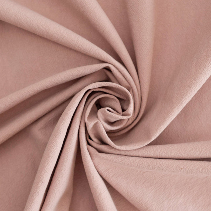 Crinkle Cotton Vintage Rose fabric in 100% cotton with textured finish for sewing skirts, dresses, and pants