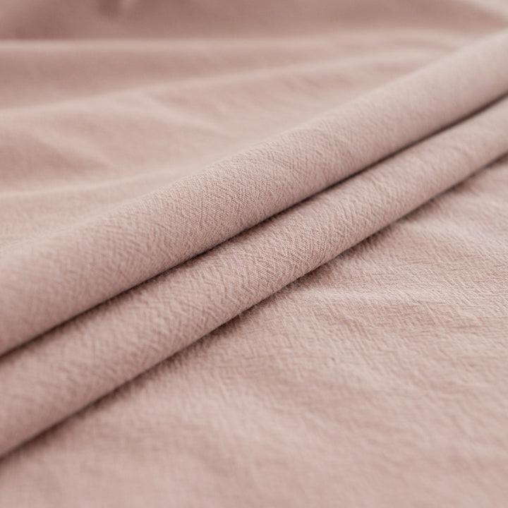 Crinkle Cotton Vintage Rose fabric in 100% cotton with textured finish for sewing skirts, dresses, and pants