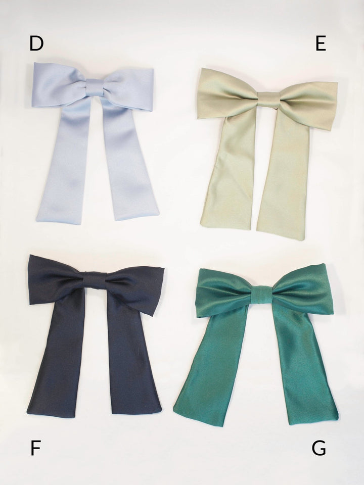 Handmade colorful classic hair bow on a barrette clip, perfect for all ages and occasions.