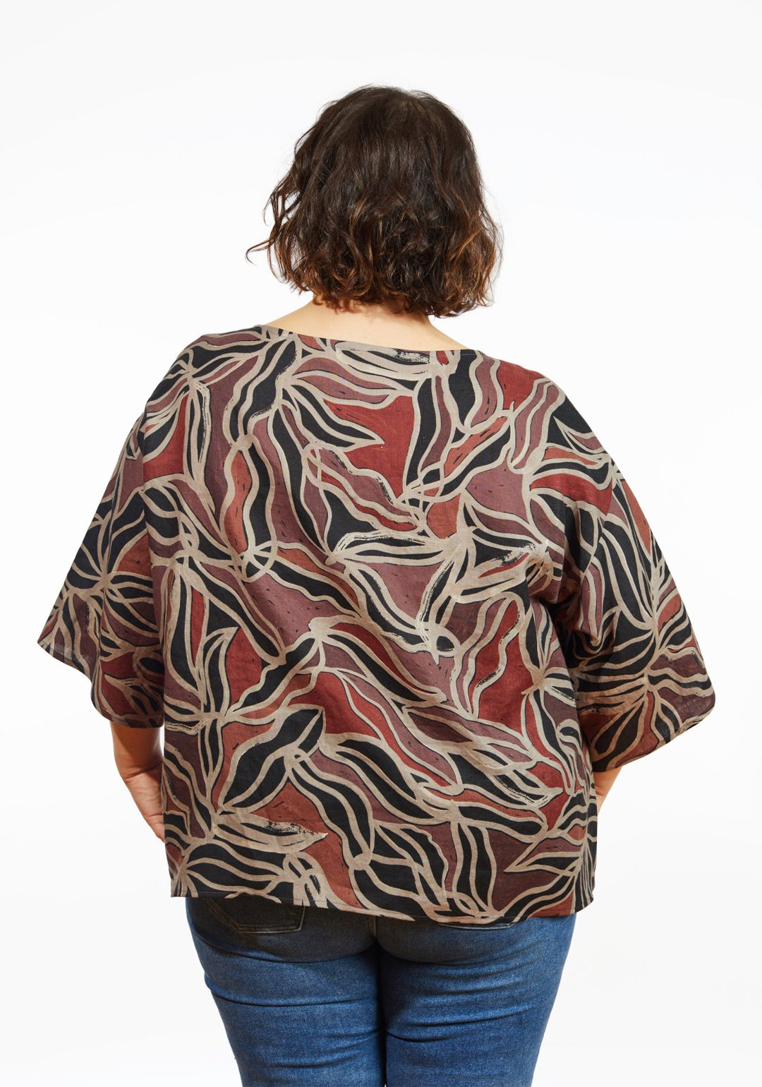 Grainline Studio Corbin Top sewing pattern for sizes 14–32, featuring ruffled cap and 3/4-length sleeve options.